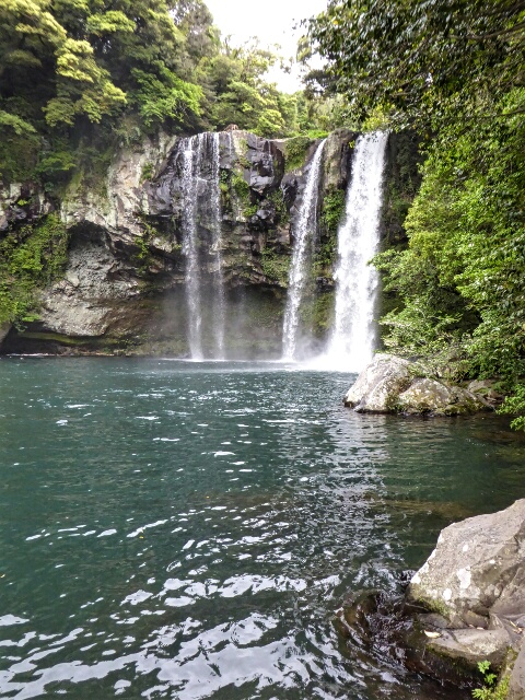Chonjiyeon Falls, 20 meters high, is on the edge of town