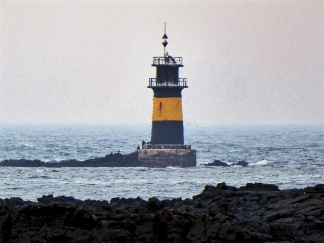 New lighthouse on a rocky coast