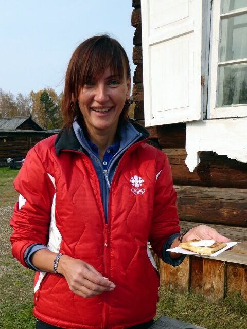 Marina, our Russian tour guide, offers a blini stuffed with farmers cheese