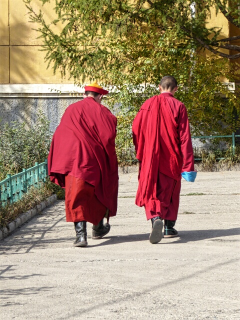 Monks return to the temple