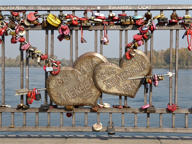 Newlyweds put locks on this bridge and throw the keys into the Angara River