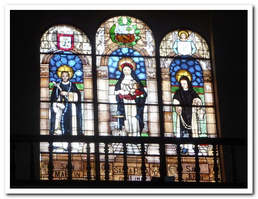 Stained glass windows with Lima´s Saints