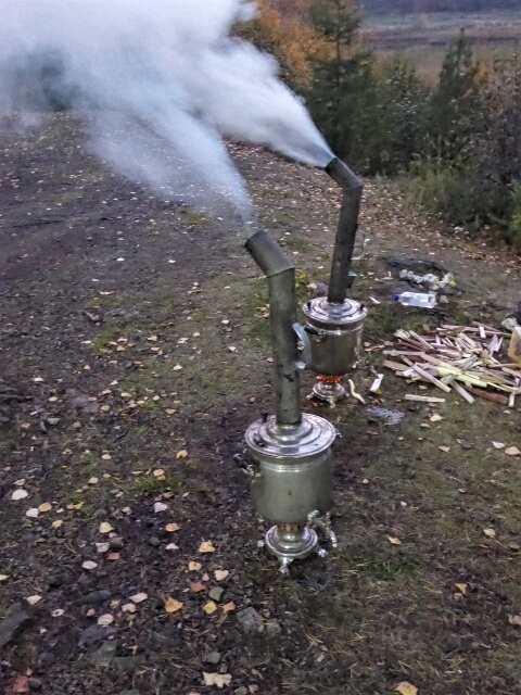 Traditional wood fired samovars preparing tea