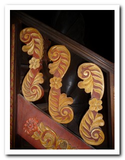 Stylized seahorses leading to the pulpit